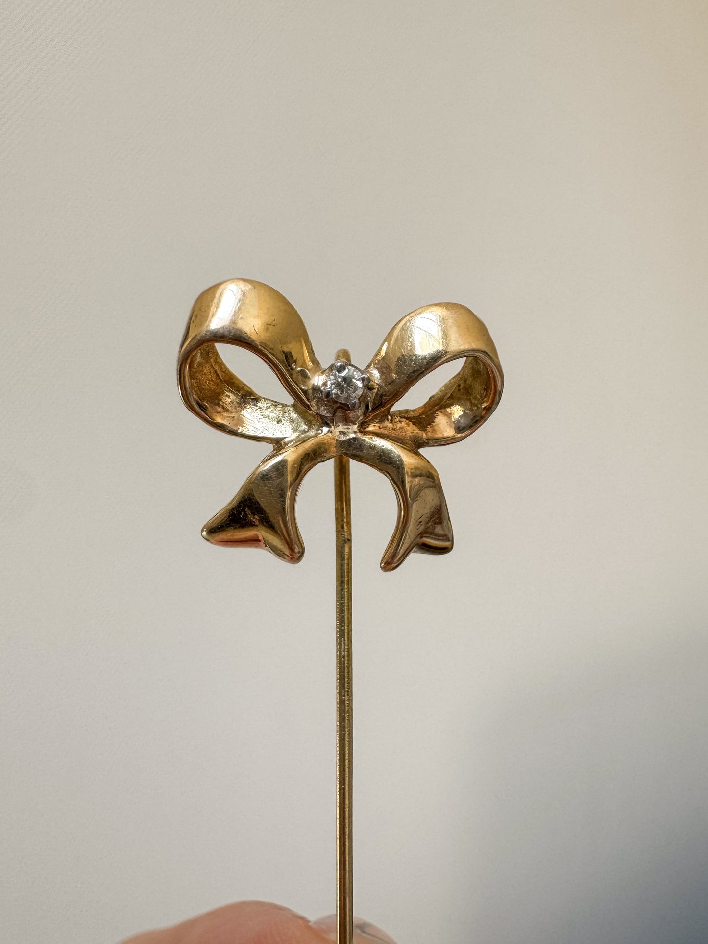 Vintage 14K Gold Bow Stick Pin with Diamond Accent